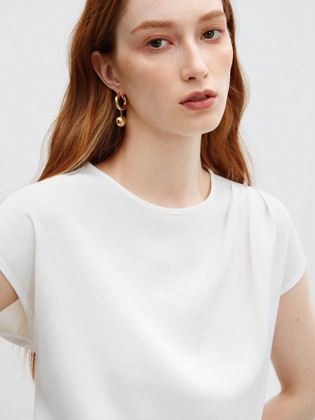 White Asymmetrical Batwing Sleeve Top