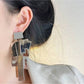 Exaggerated Geometric Square Pendant Earrings With Metallic Tassel