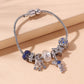 Rhinestone Star & Astronaut Charm Bracelet