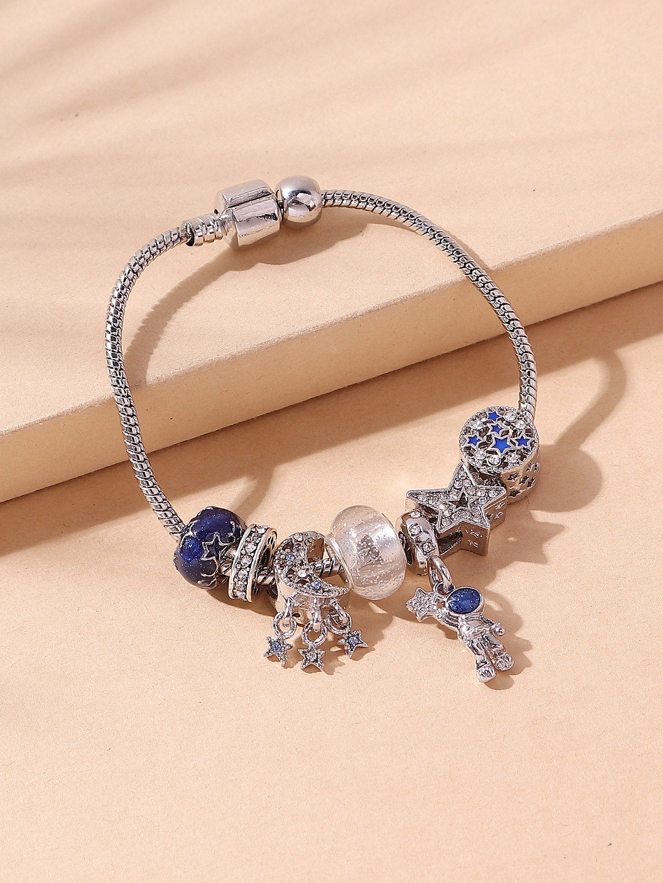 Rhinestone Star & Astronaut Charm Bracelet